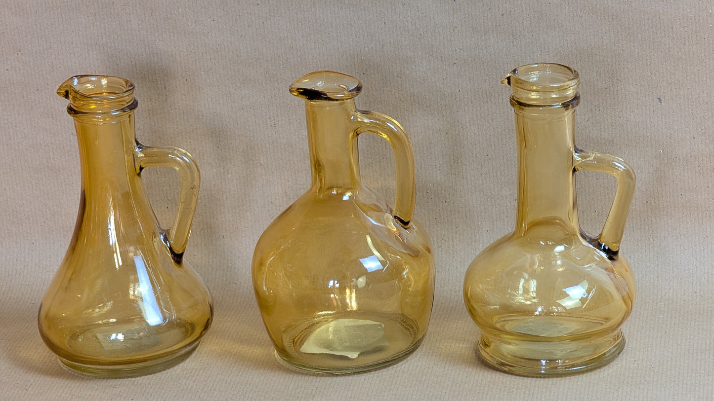 Yellow vase with green bouquet